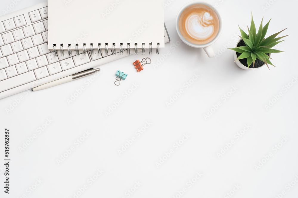 Wall mural flat lay, business office and education concept on white table desk background with blank notepad on