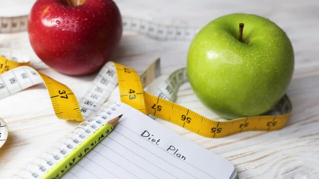 Weight loss and diet concept. healthy lifestyle and diet concept. diet plan and two juicy apples as a symbol of healthy food. eat healthy.nutritionist