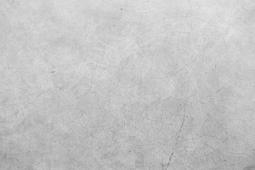white grunge cement or concrete painted wall texture. White cement stone concrete plastered stucco wall painted. The cement crack wall background abstract gray concrete texture for interior design.