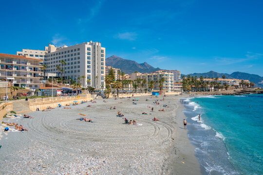 View of beach, hotels and coast at Nerja, Nerja, Malaga Province, Andalucia