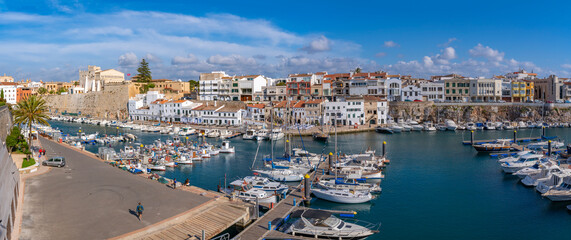 View of boats in marina and whitewashed houses from elevated position, Ciutadella, Menorca, Balearic Islands
