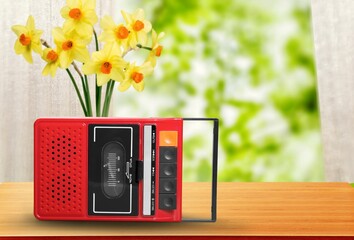 Old a radio receiver in an old retro style on interior background