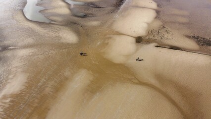 Top down view of a sandy beach. 