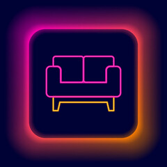 Glowing neon line Sofa icon isolated on black background. Colorful outline concept. Vector