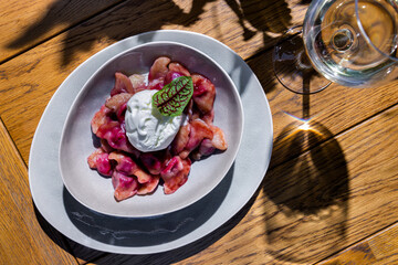 Dumplings with cherries, sorrel and a scoop of ice cream