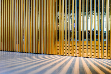 Modern restaurant room interior with wooden lattice partition