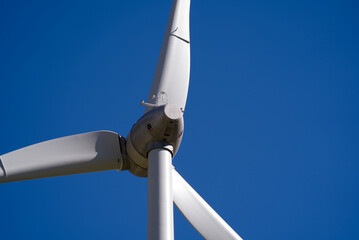 Close-up of wind turbine at summit of Gotthard Pass on a sunny summer day. Photo taken June 25th, 2022, Gotthard Pass summit, Switzerland.