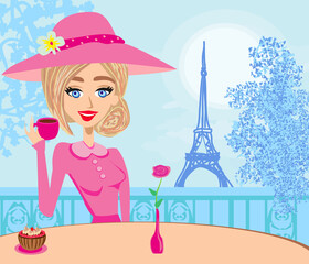 Pretty elegant girl in the Parisian cafe
