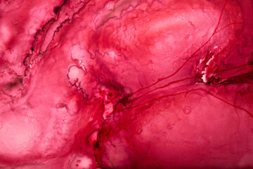 Ruby pink ink abstract background, marble texture, fluid art pattern wallpaper, paint mix underwater wavy spots and stains