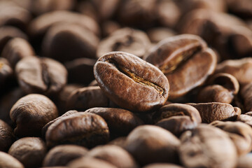 Roasted coffee beans macro close up background