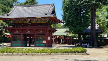 Fototapeta premium Japanese shrine at the June purification ceremonial setting, the ring of “Chinowa” displayed in front of the main enshrinement that people go through for this certain ceremony. Year 2022 June 28th 