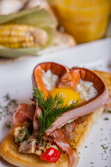 Egg with sausage heart