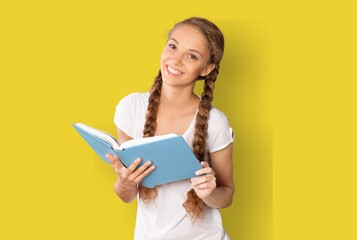 Funny lady read book wear on yellow color background
