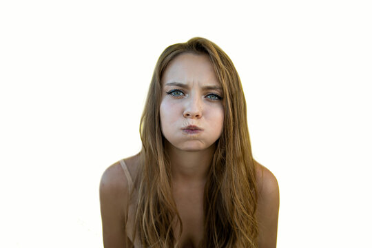 Holding Her Breath - This is a shot of a woman making a funny face with puffy cheeks while holding her breath.
