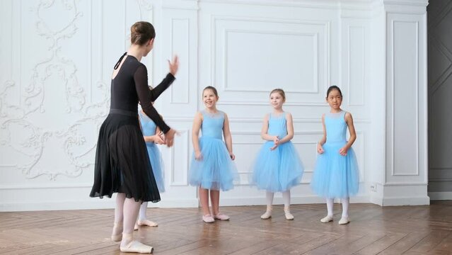 Ballet School. Small ballerinas learn to dance. Beautiful view. 4K