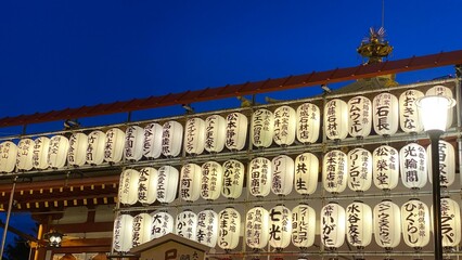 Japanese temple at night with its festive paper lanterns in lit, beautiful vivid blue sky and the traditianl scenery, year 2022 June 25th, Ueno &ldquo;Bentendo&rdquo; temple at park