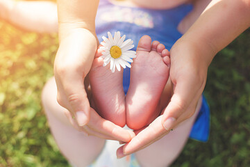 Baby`s feet. tiny infant feet. Baby care concept. Natural. Motherhood.