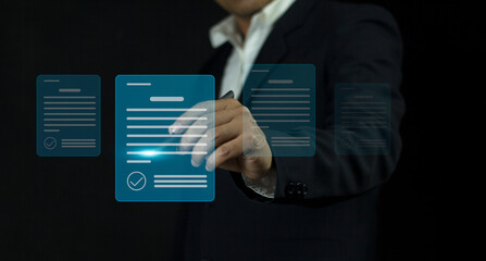 electronic signature concept A businessman in a dark suit signs electronic documents on digital documents. paperless office Signing a future business contract
