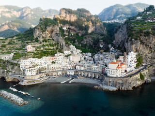 Fototapeta na wymiar View from above, stunning aerial view of the village of Atrani. Atrani is a city and comune on the Amalfi Coast in the province of Salerno, Italy. Tilt-shift effect applied.
