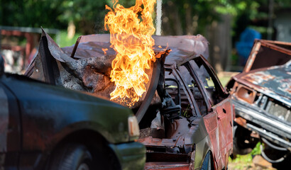 Car accident with fire flame.