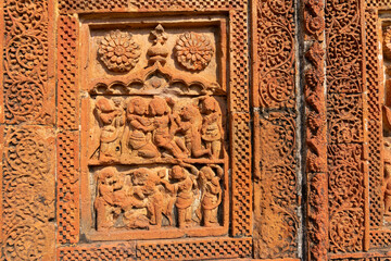 Famous terracotta (fired clay of a brownish-red colour, used as ornamental building material) relief artworks at Madanmohan Temple, Bishnupur, West Bengal, India. UNESCO heritage site of India.