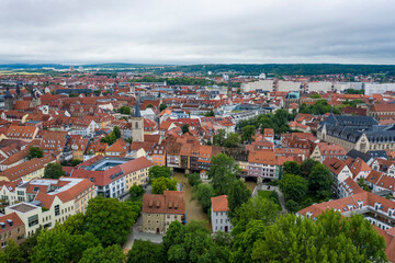 Fototapeta na wymiar Aerial view of the historic center of Erfurt old city from above with old houses , bridge and churches