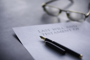 Legal concept. The procedure for writing the last will. Papers with testament on the table....