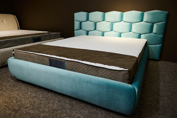 A comfortable modern stylish velour turquoise double beds with orthopedic hard mattresses,...