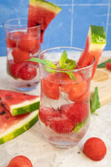 Sparkling water with frozen watermelon and mint
