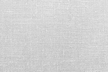 White burlap fabric sackcloth texture background white gray color. The texture of the material is light. Sackcloth