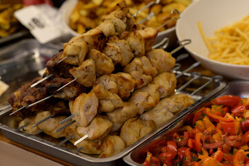 meat shish kebab on the grill. traditional outdoor barbecue picnic. grilled meat bbq