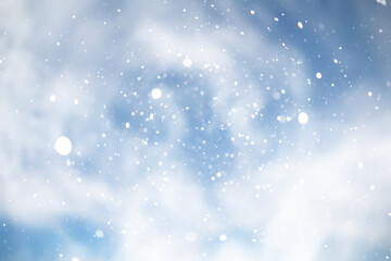 blue snowfall bokeh background, abstract snowflake background on blurred abstract blue