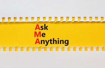 AMA ask me anything symbol. Concept words AMA ask me anything on yellow paper on a beautiful white...