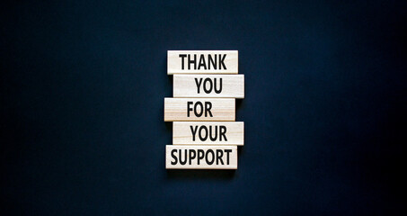 Thank you for support symbol. Concept words Thank you for your support on wooden blocks on a...