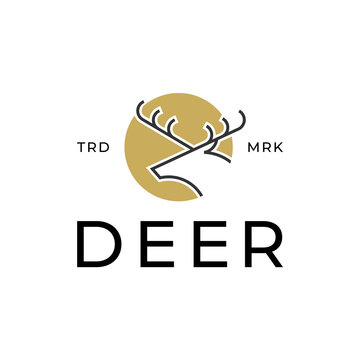 deer with golden circle logo design