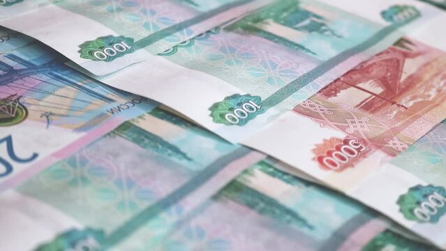 Russian cash - 1000, 2000, 5000 ruble bills.