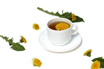 A cup of dandelion tea stands on a white background.