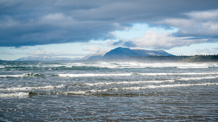 Waves crash over Pacific shoreline