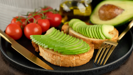 Avocado toast. Sliced avocado on bread
