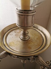 Antique silver candlestick close up.