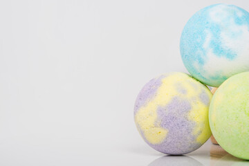 close-up of multicolored bath salts, in the form of bombs, there is a place for the inscription