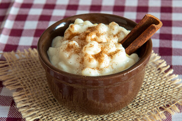 traditional sweet from the Brazilian June festivals, made of white corn with coconut and condensed...