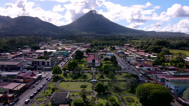 Beautiful cinematic  aerial footage of San Carlos La Fortuna Town - Arenal Volcano la Fortuna Church in Costa Rica