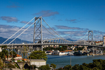Plakat Sunny day view of the Hercilio Luz suspension bridge. The longest suspension bridge in Brazil and the symbol of the city of Florianopolis. Design engineering structure bridge. Bridge structures
