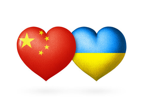 Two flags. Flags of Ukraine and China. Two hearts in the colors of the flags isolated on a white background. Protection, solidarity and help.