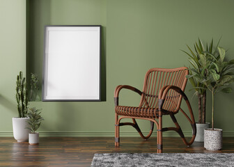 Empty vertical picture frame on green wall in modern room. Mock up interior in scandinavian, boho style. Free, copy space for your picture. Rattan armchair, plants. 3D rendering.