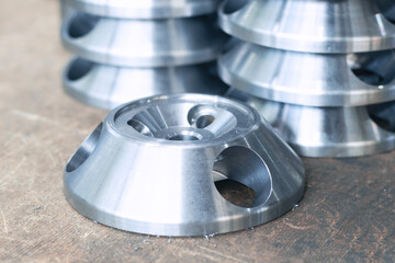 Metal parts turned on a lathe. Products manufactured at a metalworking plant	

