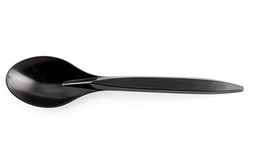 Plastic black disposable spoon isolated on a white background. Top view on white background. Close-up
