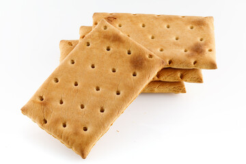 Pile of rectangular biscuits isolated on white background. Full depth of field. Close-up.