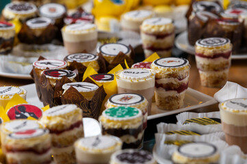 cakes sweets candy bar for guests in the restaurant on the catering table